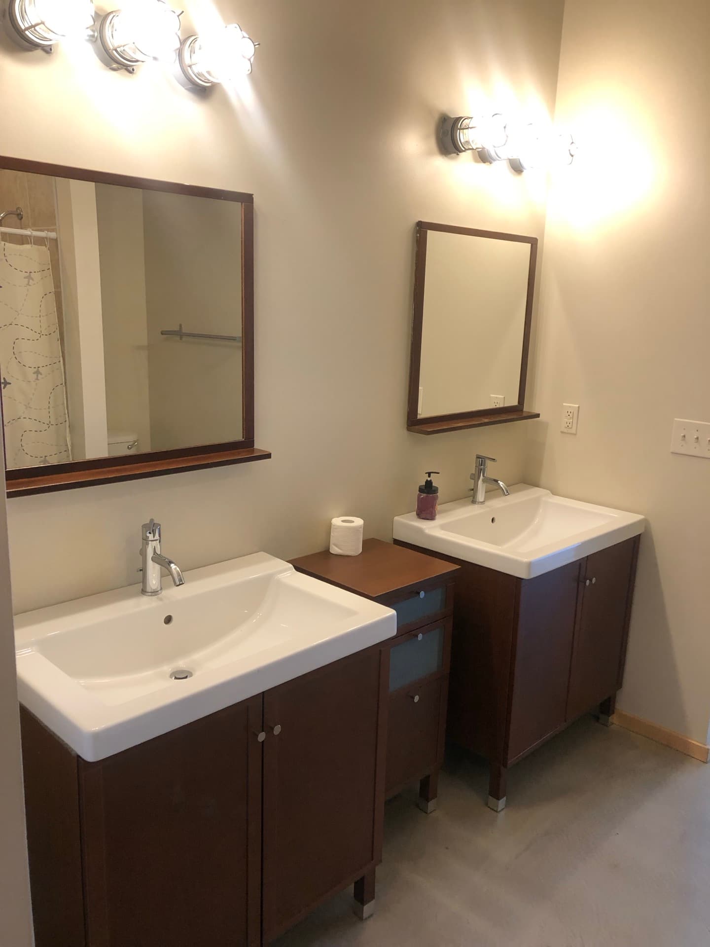Bathroom with dual vanities